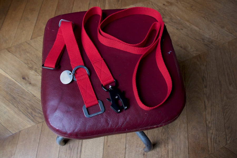 red dog collar with matching lead made from a comfy cotton weave with sturdy fastenings